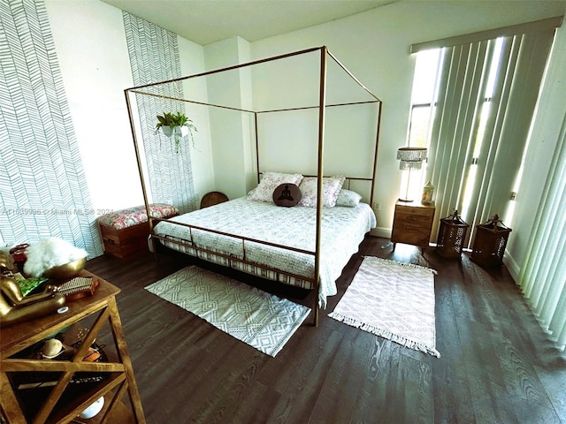 bedroom with wood finished floors