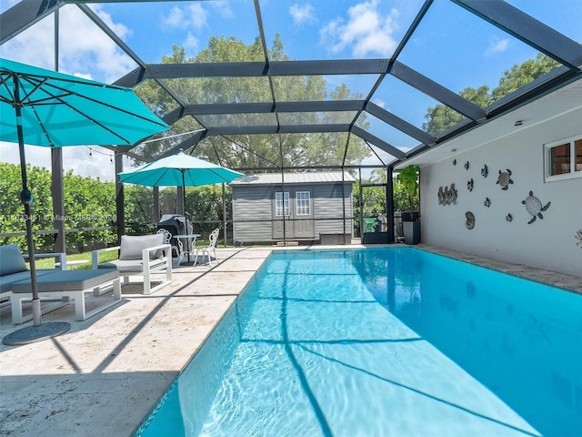 outdoor pool with a lanai, an outdoor structure, a storage shed, and a patio