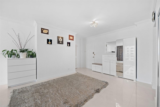 interior space featuring light tile patterned flooring and ornamental molding