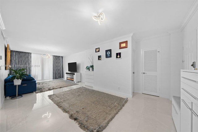 living room with ornamental molding and light tile patterned floors