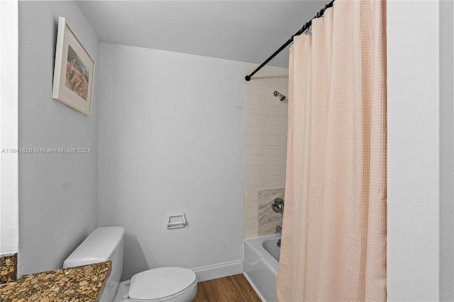 full bathroom featuring toilet, vanity, shower / tub combo with curtain, and wood-type flooring