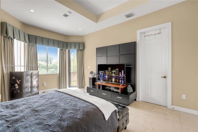 bedroom with light tile patterned flooring