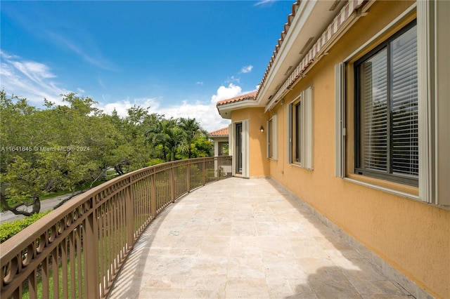 view of patio / terrace with a balcony