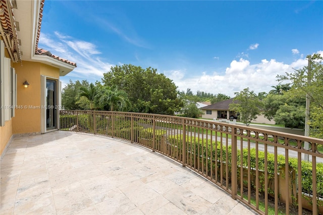 view of patio / terrace with a balcony