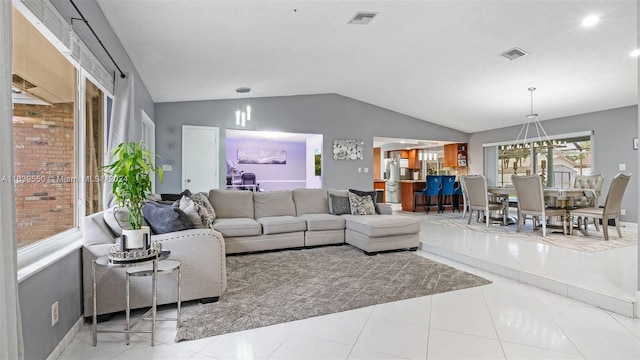 tiled living room featuring lofted ceiling