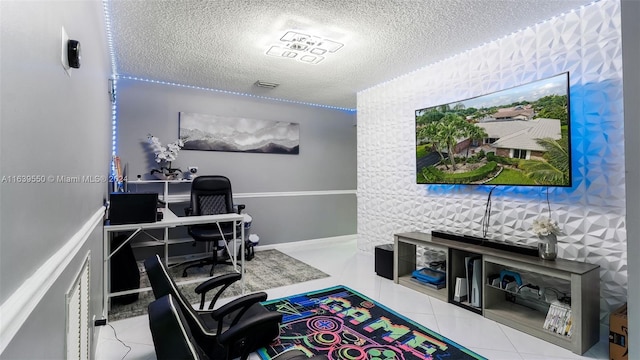 tiled office space with a textured ceiling