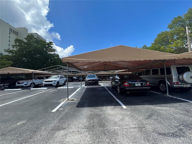 view of parking with a carport