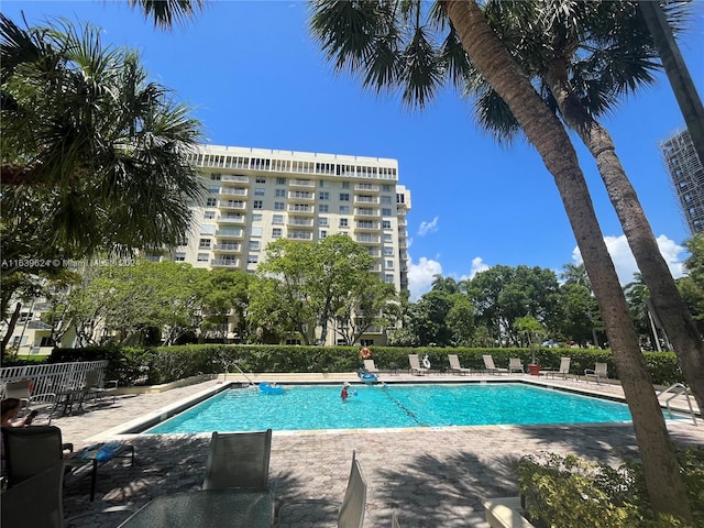 view of pool featuring a patio area