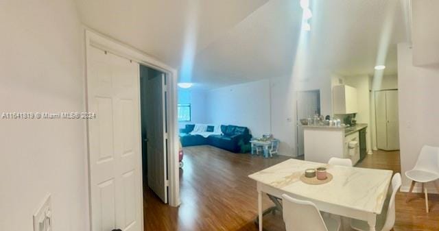 dining room with dark wood-type flooring