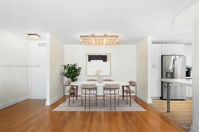 dining area featuring light hardwood / wood-style flooring