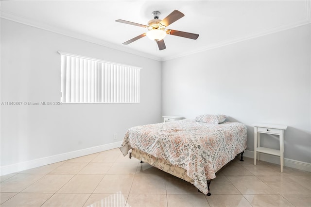 bedroom with ceiling fan, light tile patterned flooring, and crown molding