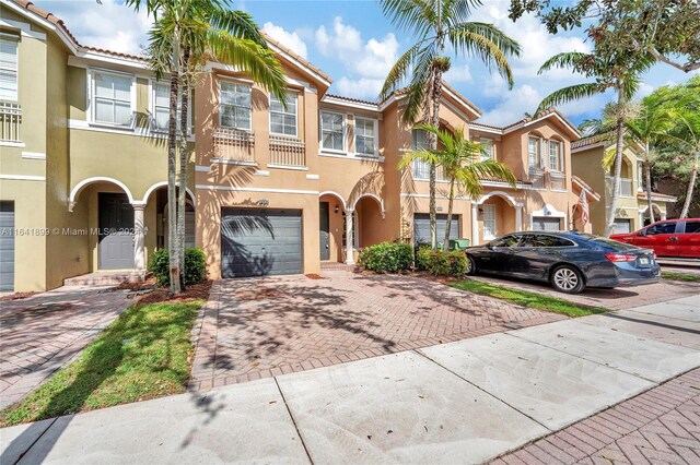 view of property with a garage