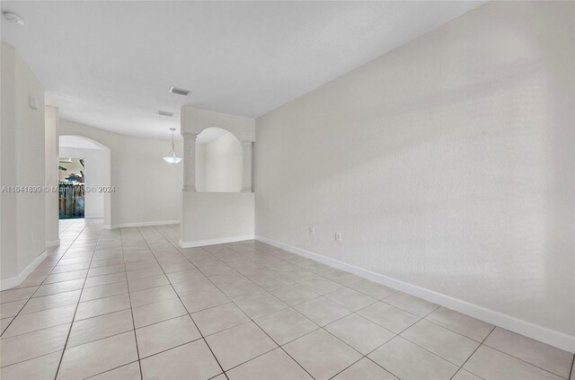 view of tiled spare room