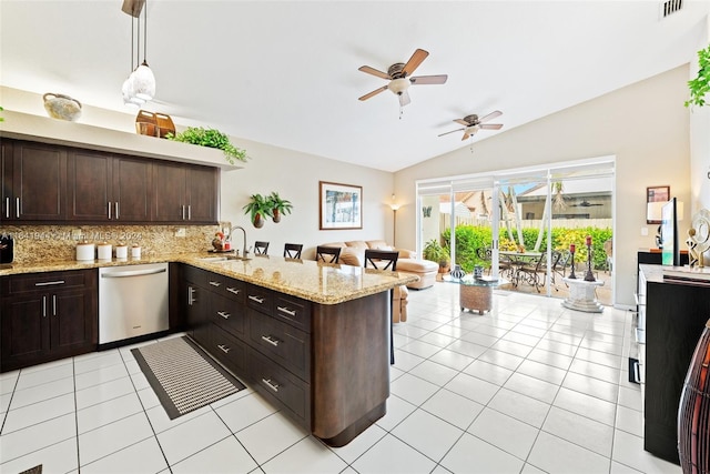 kitchen featuring light tile patterned floors, a peninsula, a sink, open floor plan, and dishwasher