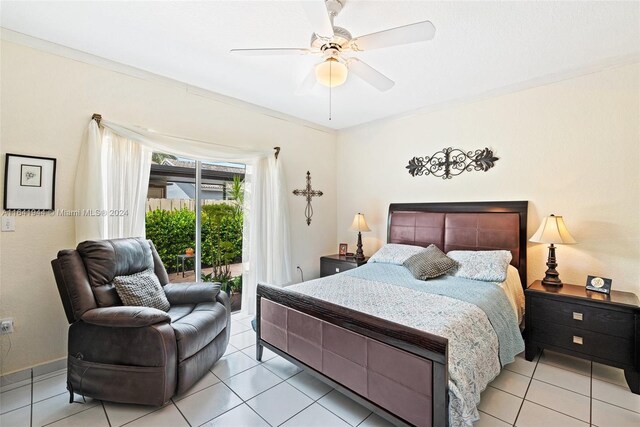 bedroom featuring access to exterior, baseboards, a ceiling fan, and crown molding