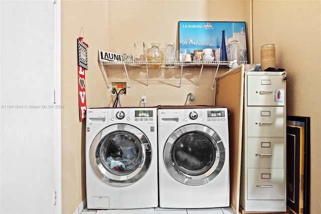 laundry room featuring independent washer and dryer