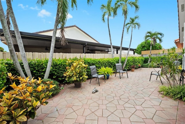 view of patio / terrace featuring a fenced backyard and ceiling fan