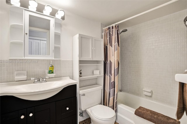 full bathroom featuring vanity, tasteful backsplash, tile walls, toilet, and shower / bath combo