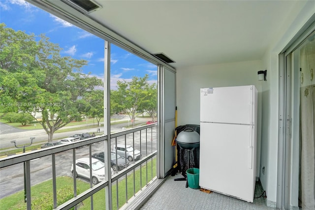 sunroom / solarium with a healthy amount of sunlight