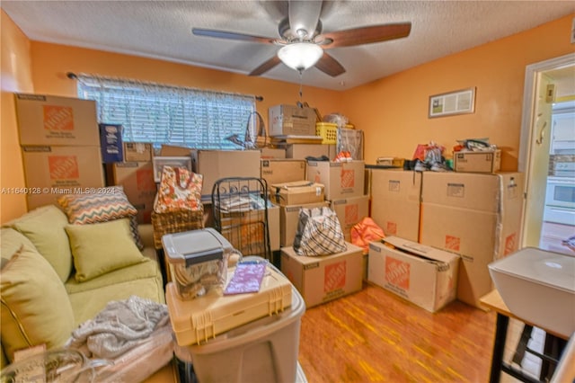 storage area with ceiling fan