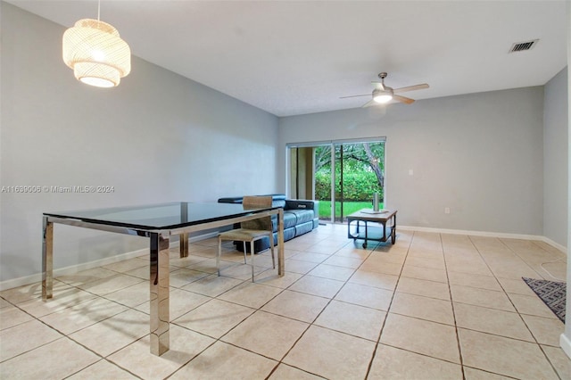 dining room featuring ceiling fan and light tile patterned floors