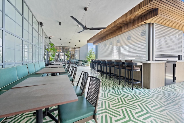 interior space featuring carpet floors and ceiling fan