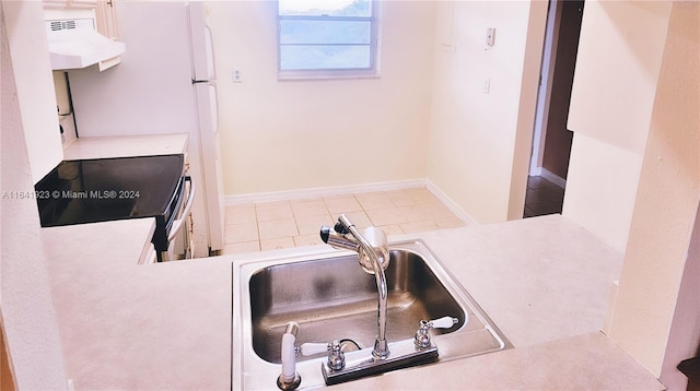 kitchen featuring sink, tile patterned flooring, custom range hood, and electric range oven