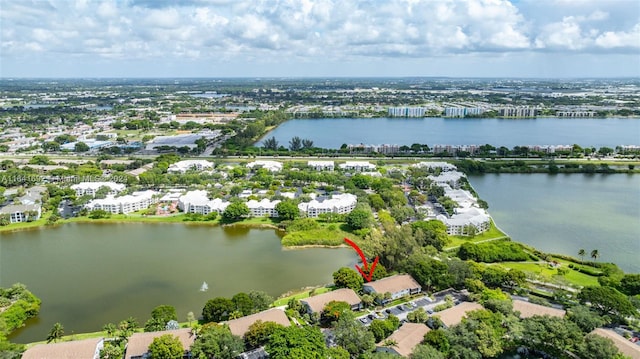 drone / aerial view with a water view