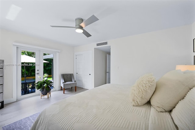 bedroom with ceiling fan, light wood-type flooring, french doors, and access to exterior