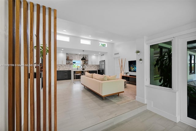 living room with light hardwood / wood-style floors