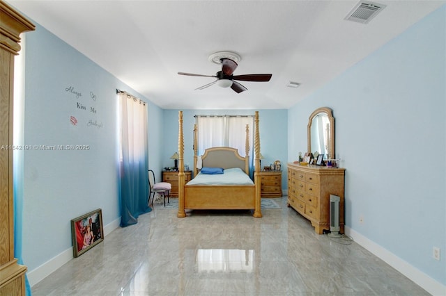 bedroom with baseboards, ceiling fan, and visible vents