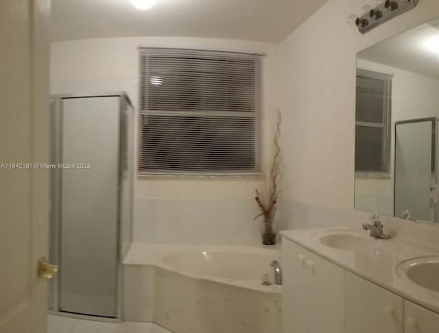 6049 SW 165th Ave, Miami, FL 33193 - bathroom featuring a garden tub, a stall shower, and double vanity