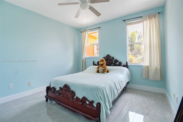 bedroom with baseboards and ceiling fan