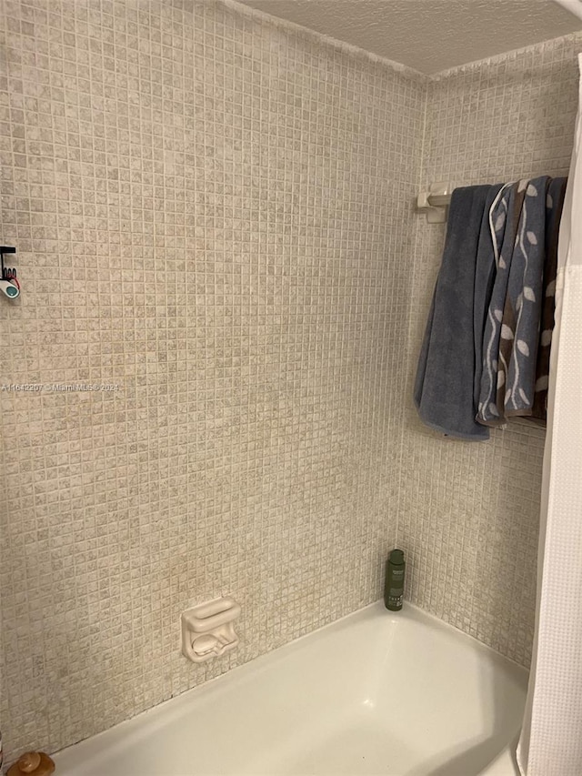 bathroom with a textured ceiling