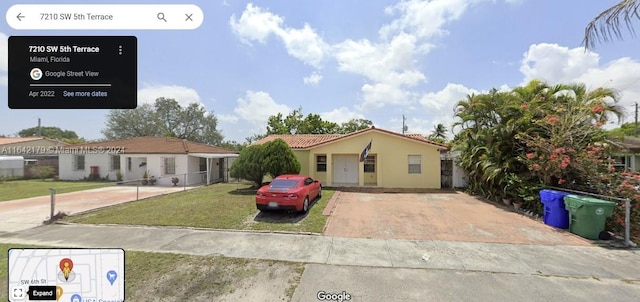 view of front facade with a front lawn