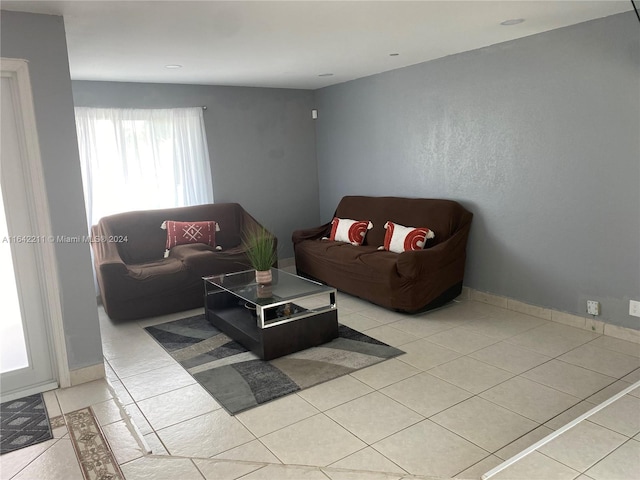 20042 W Lake Dr, Hialeah, FL 33015 - living room featuring light tile patterned floors