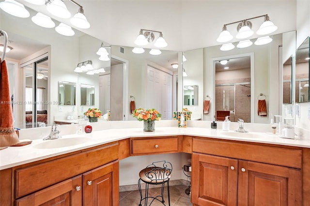 bathroom featuring vanity and tile patterned flooring