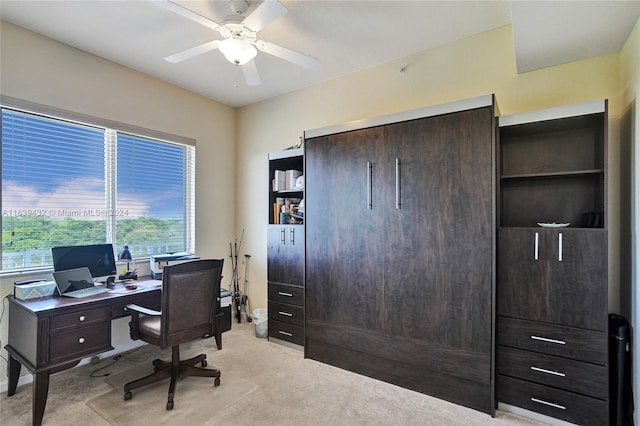 office area with ceiling fan and light colored carpet