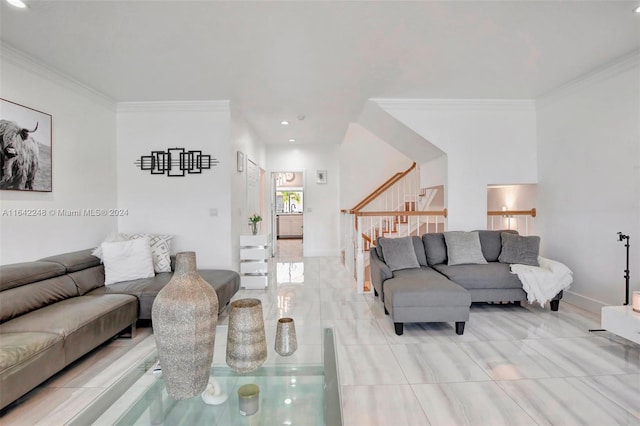 living area with crown molding, stairs, and baseboards