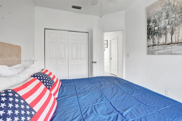 unfurnished bedroom featuring visible vents, a closet, and a ceiling fan