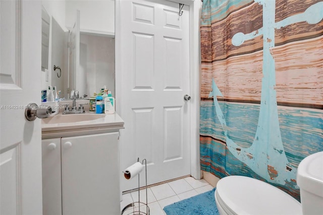 full bath with vanity, tile patterned floors, and toilet