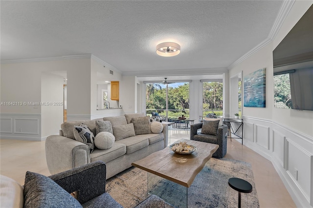 living room featuring crown molding and a textured ceiling