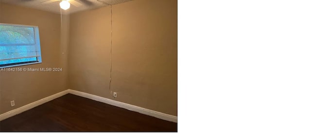 unfurnished room featuring ceiling fan, baseboards, and a textured ceiling