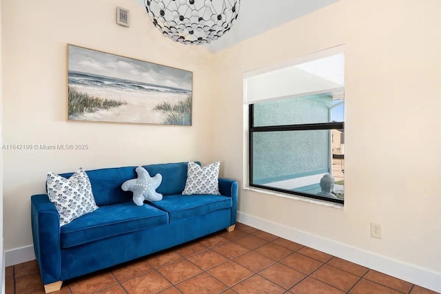 sitting room with tile patterned flooring