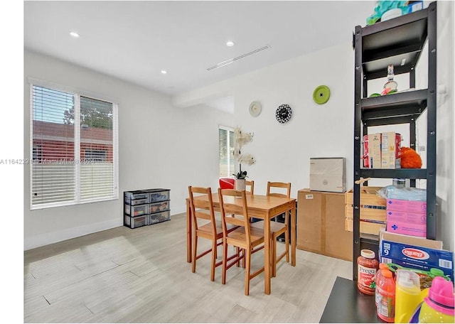 dining room featuring light hardwood / wood-style flooring