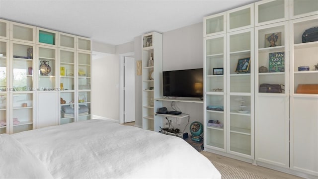 bedroom with light wood-style flooring