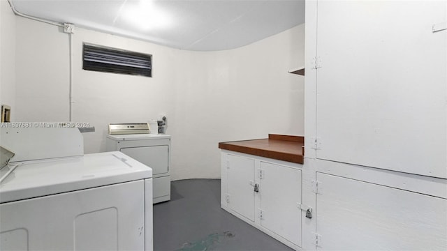 laundry area with laundry area and washing machine and dryer