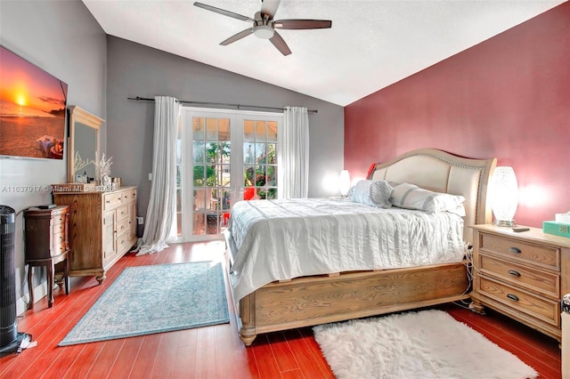 bedroom with access to outside, ceiling fan, wood-type flooring, and lofted ceiling