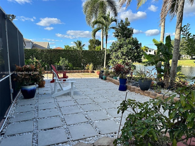 view of patio / terrace with a water view