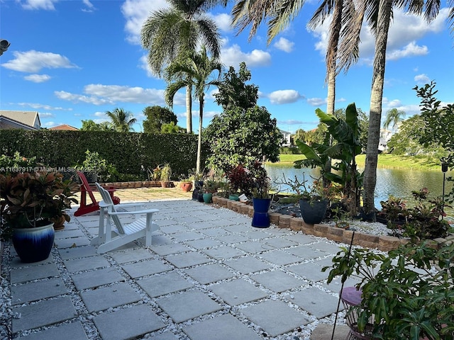 view of patio featuring a water view